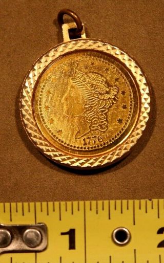 Twenty Dollar gold Coin TRIBUTE in a round Bezel/charm setting 3