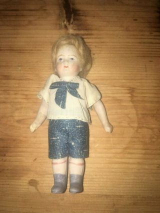 Antique Bisque Boy Doll With Jointed Arms,  Mohair Wig Wearing Short Set