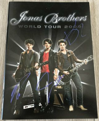 The Jonas Brothers Signed 2009 World Tour Program W/proof Nick Joe & Kevin