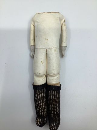 8 1/2” Kid Leather & Cloth Doll Body With Bisque Hands.