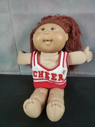 2005 Cabbage Patch Girl Doll,  Brownish/red Hair,  Brown Eyes With Cheer Top