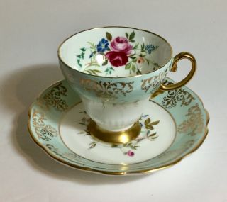 Vintage Eb Foley Footed White With Blue Gold Pink Roses Tea Cup And Saucer Set