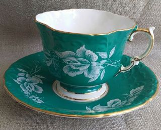 Aynsley Embossed Green Tea Cup And Saucer With White Roses