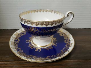 Shelley Cobalt Blue And White Teacup And Saucer With Gold Fleur De Lis And Trim