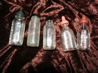 Vintage - Four Glass Doll Baby Bottles