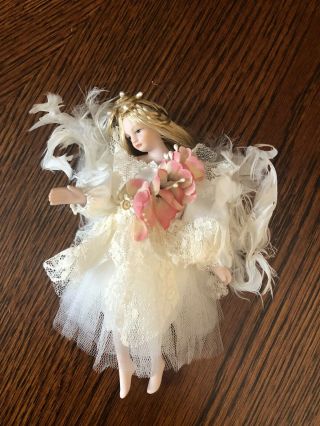 Two Bisque Collectible Mini Fairy Dolls