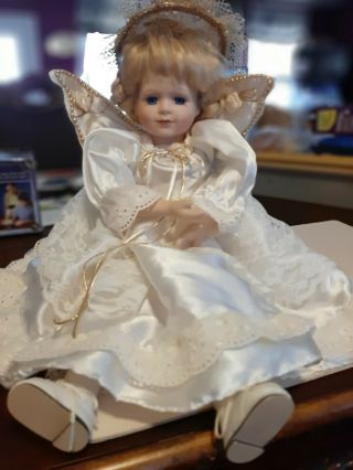 Porcelain Angel Doll With Blue Eyes