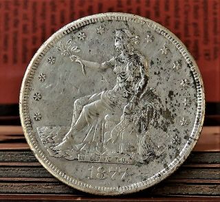 1877 - S Silver Trade Dollar $1 Au