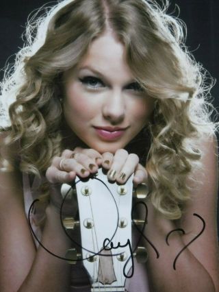 Taylor Swift Autographed Photo (w/guitar)