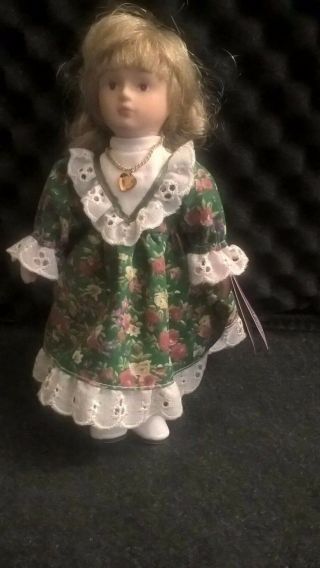 Russ Berrie Porcelain Doll Of The Month November Topaz 8 " High.  No Stand