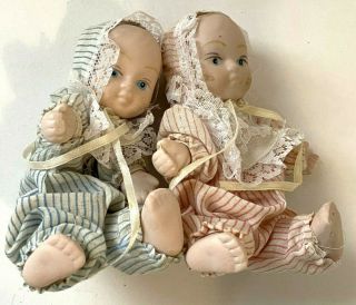 2 Vintage 5 " Bisque Porcelain Boy & Girl Baby Dolls Wired Stuffed Cloth Body