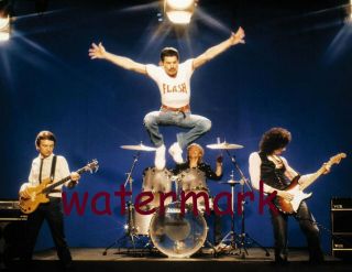 Queen Freddie Merury Performing And Jumping On Stage With Band Publicity Photo