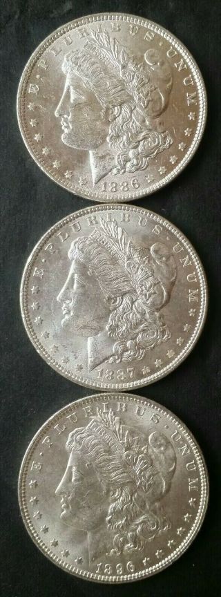 1886,  1887,  And 1896 $1 Morgan Silver Dollars