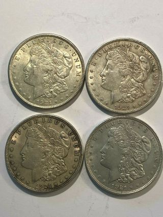 4 - 1921 Morgan Silver Dollars $1