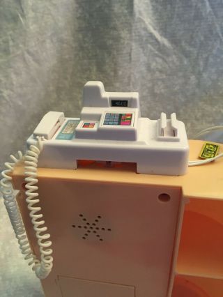 Barbie cool shoppin ' cash register with scanner that beeps.  Phone has a cord. 3