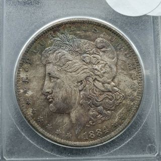 1884 O Morgan Silver Dollar Coin Choice BU Grade Accugrade Textile like Toning 2