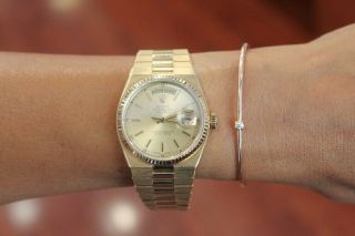Rolex Day - Date Oysterquartz President 18k Yellow Gold Champagne Dial 19018