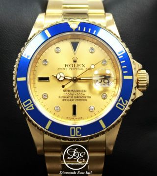 Rolex Submariner 16618 18k Yellow Gold Fact Serti Blue Sapphires Diamonds
