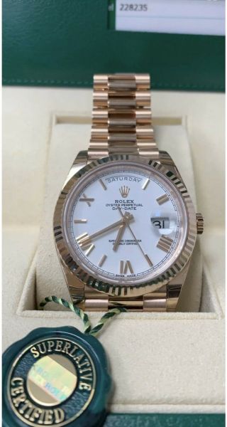 Rolex Day - Date 40 18k Everose Gold With White Roman Dial Ref.  228235