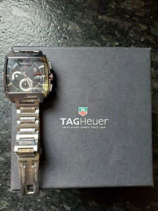 tag heuer monaco ls with 2 OEM bands,  stainless and black leather 2
