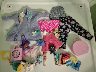 Assortment Of Random Doll Clothes,  Toys,  And Accessories