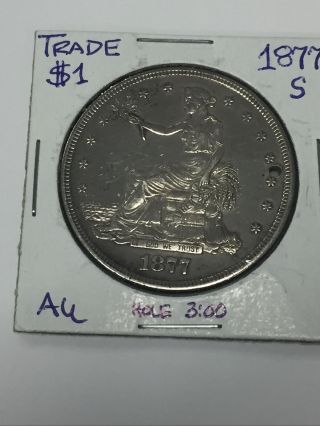 1877 S Trade Dollar.  Holed.  Xf - Au Details