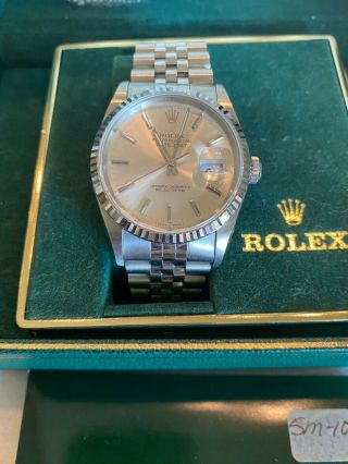 Rolex Men’s Datejust Stainless Steel.  Style R16234410b6251,  Serial No.  140387.