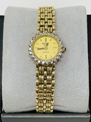 14k Yellow Gold Geneva Ladies Watch With Factory Diamond Bezel