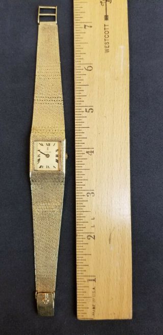 Vintage 18K Corum Man ' s Wrist Watch with 18K Band.  Running 3