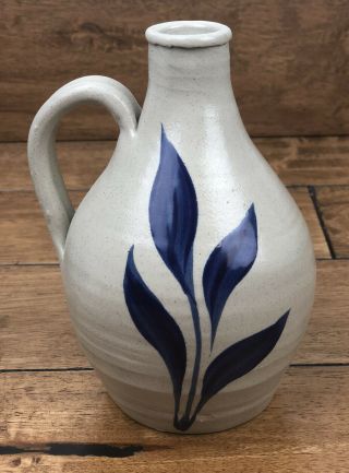 Williamsburg Pottery Co.  Salt Glazed Handle Jug Cobalt Blue Leaves 7”