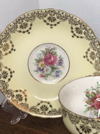 Paragon Yellow and Gold Footed Tea Cup and Saucer with Flowers 3