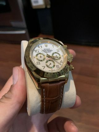 Rolex Daytona Chronograph 18k Yellow Gold White Dial Watch & Box M 116518