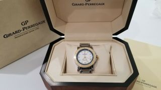 Girard Perregaux Traveller 7000 18k Gold And Stainless Steel Automatic Watch.
