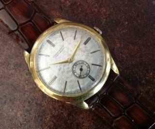 Vintage Ulysse Nardin Gold Plated Dress Wrist Watch.  Textured Dial.  C.  1950 
