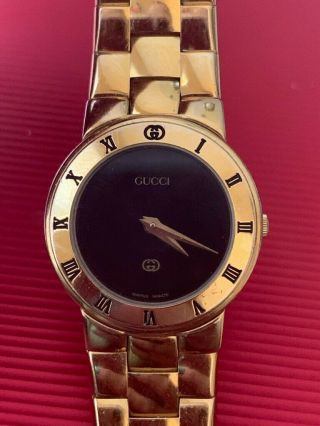 Real authentic rare Gucci women ' s Or Mens watch.  Barely comes with. 2