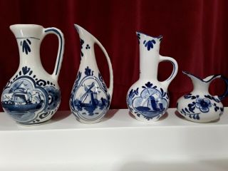 Hand Painted Blue Delft Miniature Water Pitchers Set Of 4
