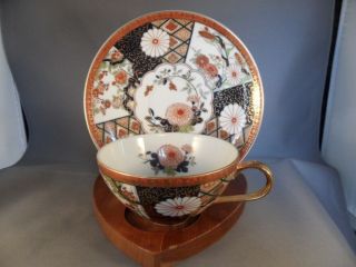 JAPAN PORCELAIN CUP AND SAUCER 999 - J ORIENTAL FLOWER RED BLUE GOLD ACCENTS 1970s 2