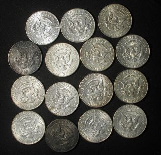 Partial roll of 15 Kennedy 40 silver US half dollars 2