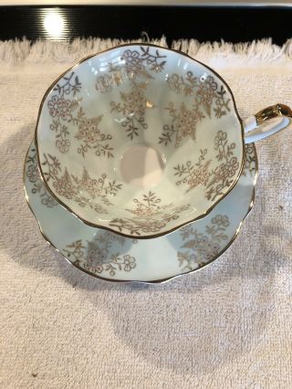 Queen Ann Pale Blue With Gold Flower Design Footed Tea Cup And Saucer