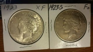 Two 1923 Peace Silver Dollars - - Two Coins - You Decide Grade -