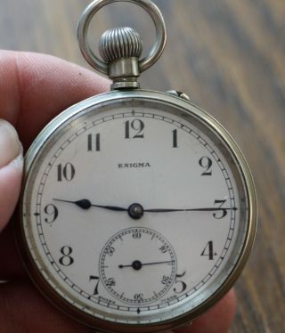 A Vintage Enigma Pocket Watch In Good Order Brevets Movement.  With Case.