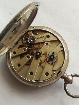 an antique silver - 800 - cased pocket watch with enamelled dial 3
