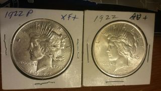 Two 1922 Peace Silver Dollars - - Two Coins - You Decide Grade -
