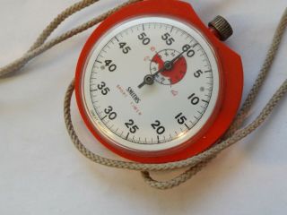 A Vintage Red Cased Smiths Sport Timer Stop Watch