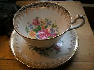 Vintage Queen Anne Tea Cup And Saucer Roses Spring Flowers Footed Gold Trim
