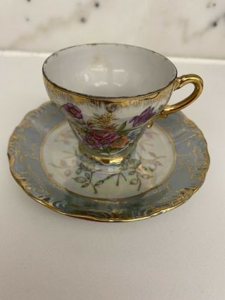 Sterling China Japan.  Tea Cup And Saucer.  Iridescent.  Floral Lusterware