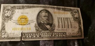 1928 $50 Fifty Dollar Gold Certificate.  .  Torn