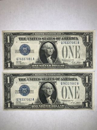 (2) 1928 A $1 Silver Certificate “funnyback” About Uncirculated Consecutive