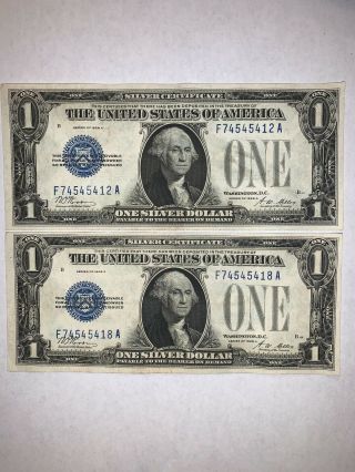 1928 A $1 Silver Certificate (2) Funny Back About Uncirculated Near Consecutive