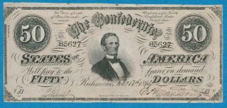 T - 66 $50.  1864 Confederate States Of America,  Au/cu